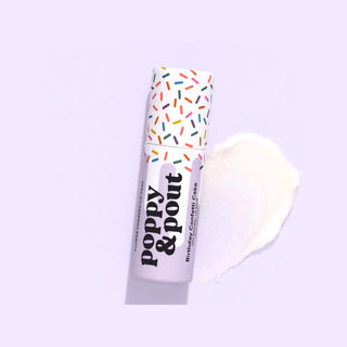 Poppy & Pout Birthday Confetti Cake lip balm on a lavender background with moisturizing balm swatch and sprinkle-pattern packaging.