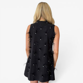 Queen of Sparkles LSU black sequin tiger dress with black feather and rhinestone embellishments, full back view