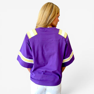 Queen of Sparkles LSU oversized jersey in purple with gold and white shoulder and sleeve details, full back view