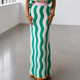 Queen of Sparkles teal midi knit skirt with pink waistband and green wave stripe pattern, front waist detail paired with matching fish knit top.