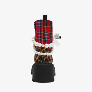 Betsey Johnson red plaid combat bootie with pearls, bows, and chunky black lug sole for bold holiday dressing