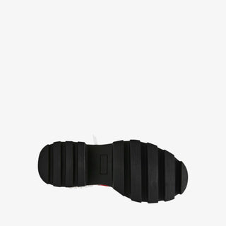 Betsey Johnson red plaid combat bootie with pearls, bows, and chunky black lug sole for bold holiday dressing