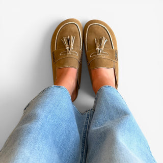 Sam Edelman Astrid suede mule in tan worn with denim front view showing slip-on fit