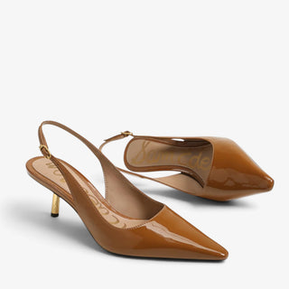 Sam Edelman Bianka brown patent slingback pumps featuring pointed toes and gold heels, close angled detail view