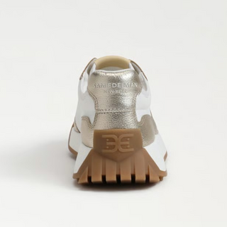 Sam Edelman Langley metallic gold and white sneaker with branded heel tab and textured gum sole, back view