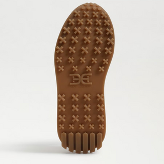 Sam Edelman Langley metallic gold sneaker with textured brown rubber traction sole, bottom view