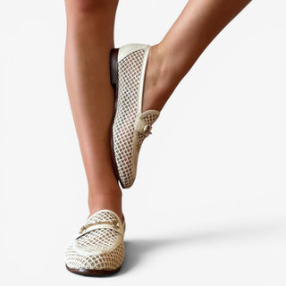 Sam Edelman Loraine mesh loafer in ivory worn on model front view showing woven mesh texture and gold bit detail