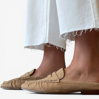 Sam Edelman Louella Cyprus Tan suede mule worn with white cropped jeans, close side on-model view