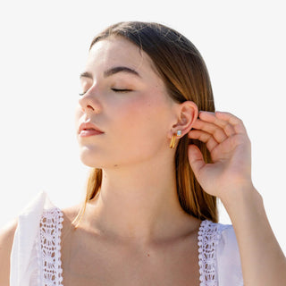 Pair of Cut Stud Earrings with geometric faceted stone and gold finish