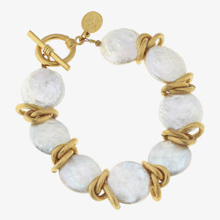 Susan Shaw freshwater coin pearl bracelet with large white pearls, gold knot accents, toggle closure, front product view