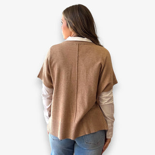 Camel knit layered top styled over white button down blouse on woman model for casual polished look