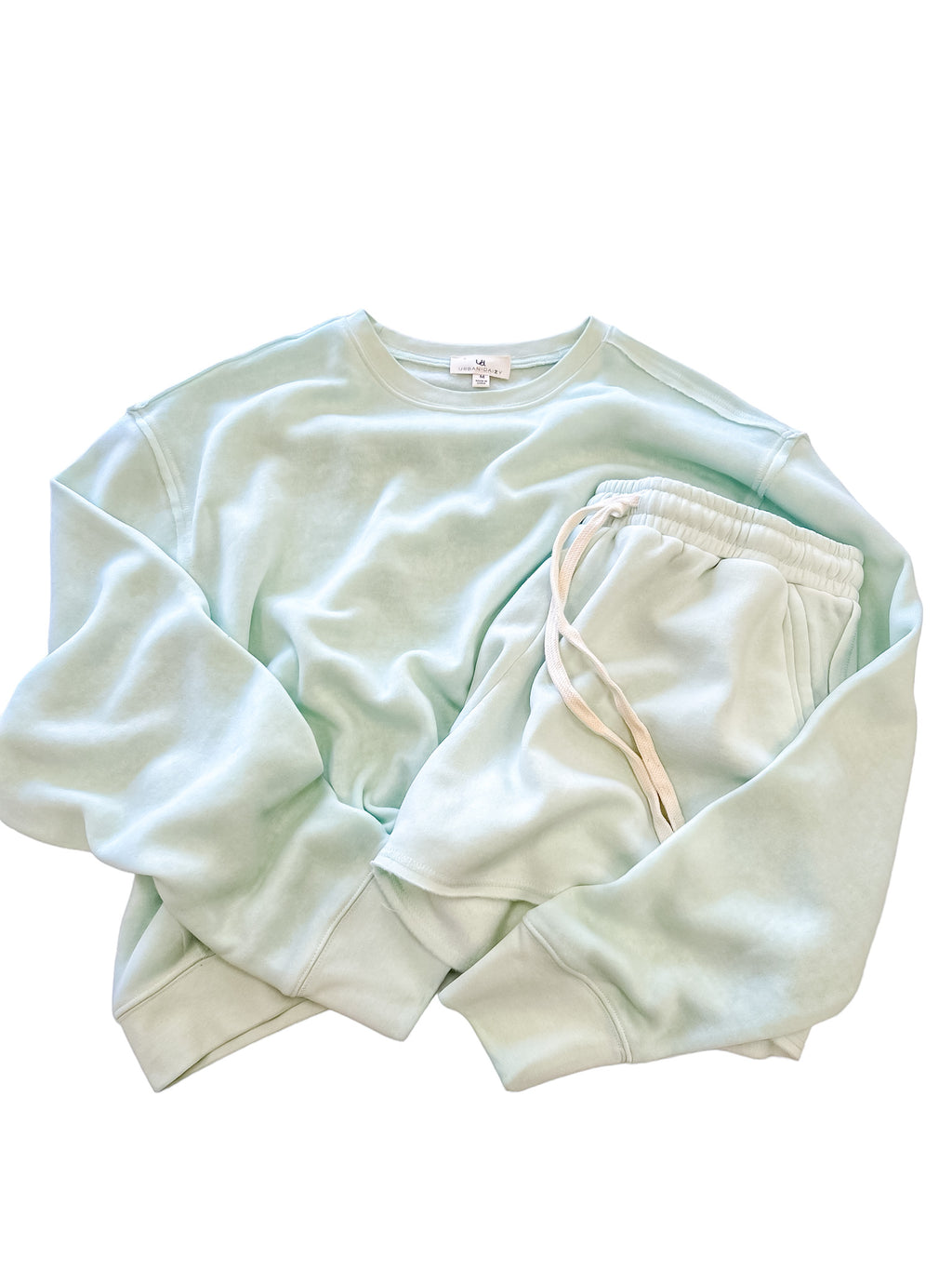 Mint Molly Sweatshirt and Short Set with crew neckline, ribbed cuffs, elastic waistline, pockets and frayed hem, perfect for stylish and comfortable lounge wear.
