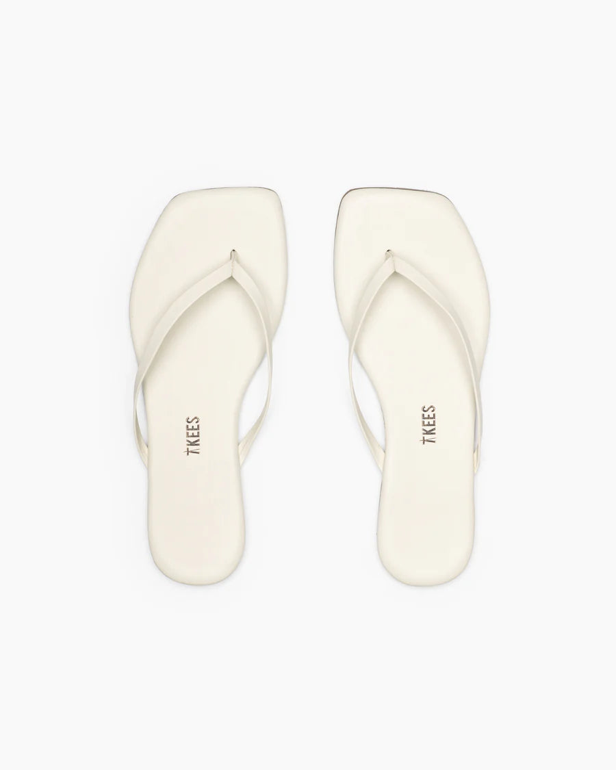 Cream Square Toe Lily Sandal for the minimalist chic! This flat design can take you from day to night.