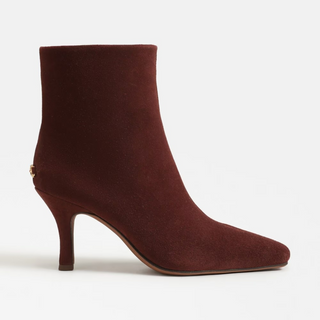 Brown ankle boot with a high heel on a white background