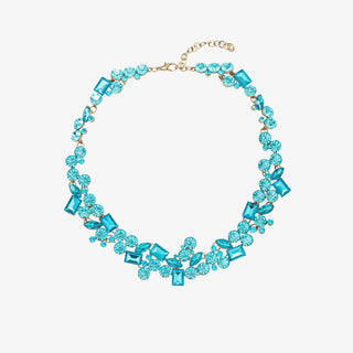 Teal turquoise statement necklace on a white background