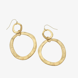 Gold hoop earrings on a white background