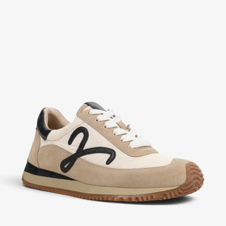 Vaneli Queen neutral sneaker with cream textile, taupe suede and black accents, angled view