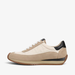 Vaneli Queen women's neutral sneaker with black logo and taupe suede trim, side view