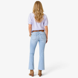 Vervet mid rise ankle jeans in light wash denim featuring classic back pockets and cropped flare leg, back view