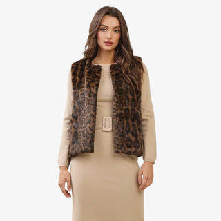 Leopard print faux fur vest with open front design styled over a beige dress