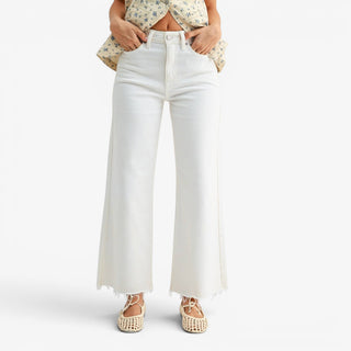 White high rise denim jeans with relaxed wide leg silhouette