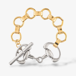 Yochi NY Kody mixed metal bracelet with chunky gold links and a silver horsebit toggle clasp shown in a front product view.