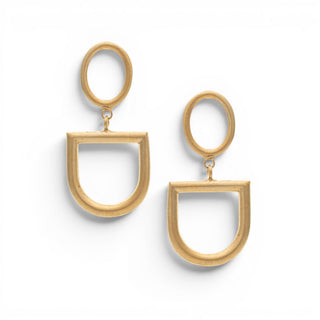 Gold geometric drop earrings by Yochi NY with open oval and curved square shapes shown in a front product view.