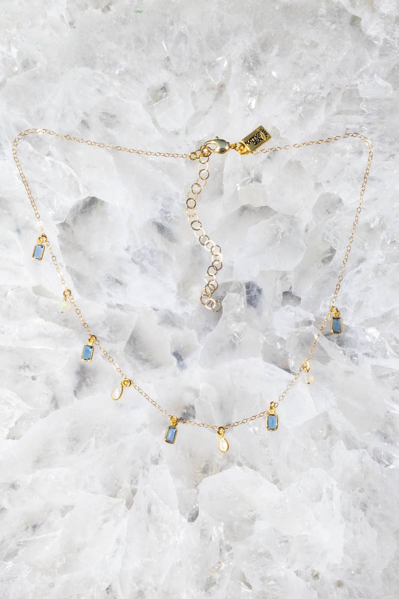14k gold vermeil necklace with multi-bezel opal & blue topaz gemstones. 16" with 2" extender.